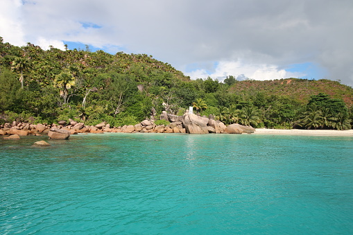 Anse Lazio is situated in the northwest of Praslin Island and is one of the most beautiful beaches in the world. The Indian Ocean has clear water and the beach has a beautiful scenery. Anse Lazio is a white sand beach and is bordered by large red granite rocks. The tropical vegetatation with evergreen Coconut Palm Trees and Takamaka Trees (Calophyllum ilophyllum) are nice places for resting in the shadow.