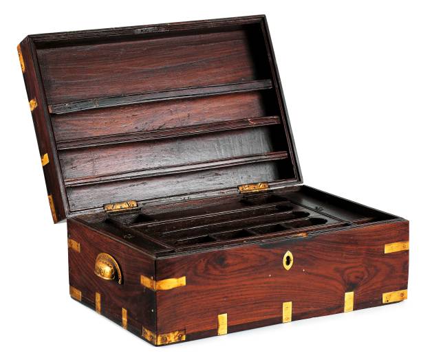 istock Open wooden chest isolated on white 655503178