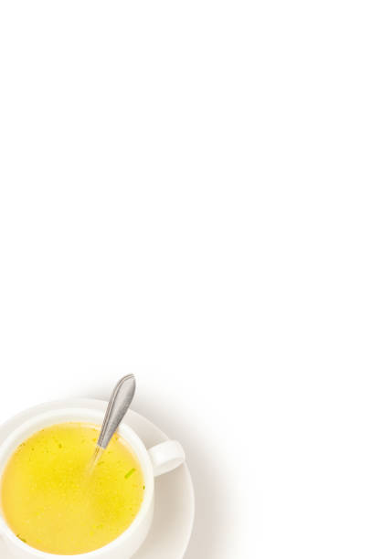 istock Bouillon and greens in bowl on white background. 655509966