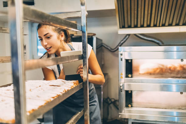 istock Checking the fresh pastry and updating the data 655510156