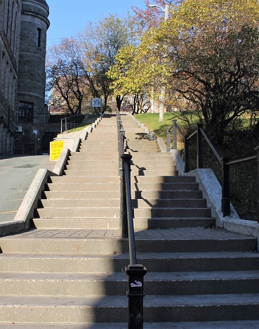 The stone stairway that runs along side the Provincial Courthouse, and connects Water Street and Duckworth Street, St. John's, Newfoundland and Labrador, Canada.
