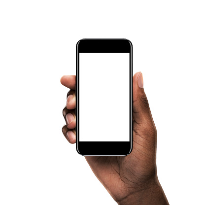 Black hand holding a smartphone with blank screen isolated on white background