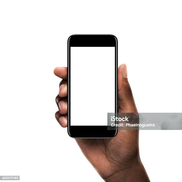 Black Hand Holding A Smartphone With Blank Screen Stock Photo - Download Image Now - Telephone, Human Hand, Hand