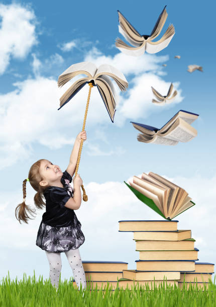 istock Elementary education concept , child girl with flying books 655522956