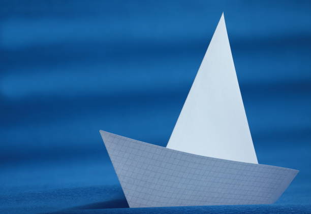 istock origami white paper yacht 655532104