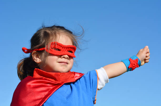 istock Superhero child - girl power 655536780