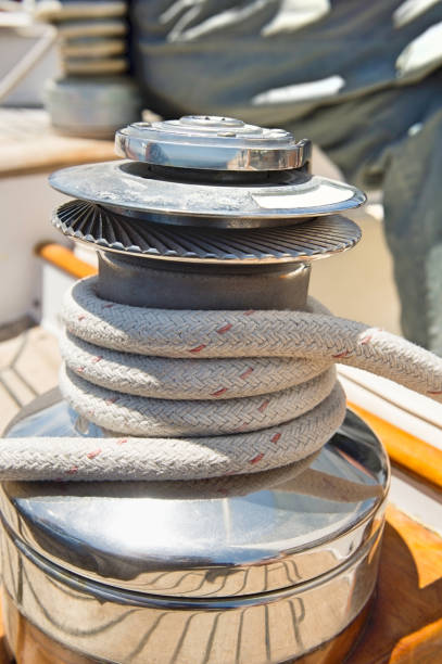 istock Rope wound around winch on sailboat 655537132