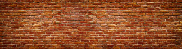 istock panoramic view of masonry, brick wall as background 655539910