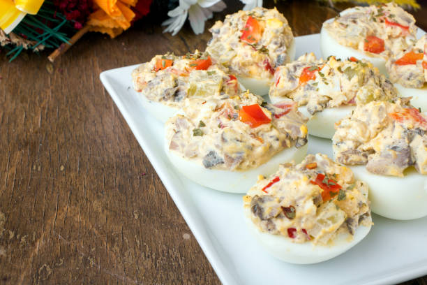istock stuffed eggs with peppers, mushrooms and herbs - selective focus 655540226