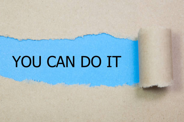 istock Torn brown paper with You Can Do It words. 655540230