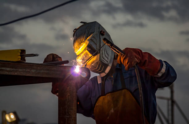 istock Welder working on the Oil Field 655540714