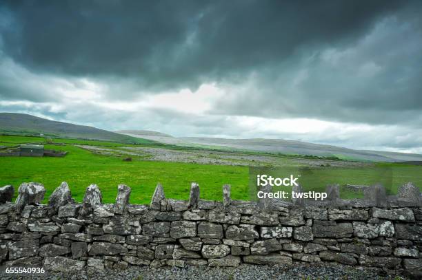 Storm Cloulds And Old Stone Wall Stock Photo - Download Image Now - Galway, Climate Change, Ireland