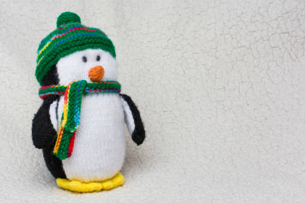 istock Penguin stuffed toy on white fluffy background copy space 655541218