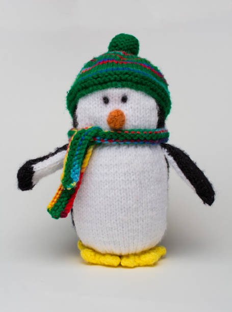 istock Penguin stuffed toy on white background vertical 655541224