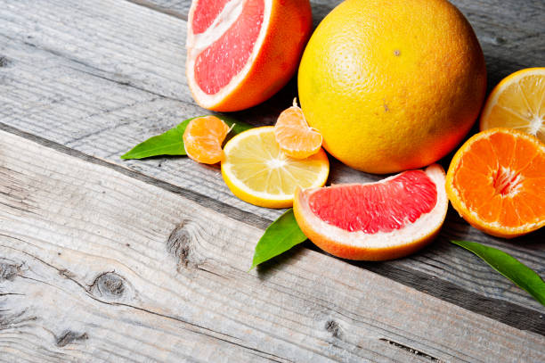 istock Citrus fruits - lemon, mandarin, grapefruit, top view, copy space 655548396