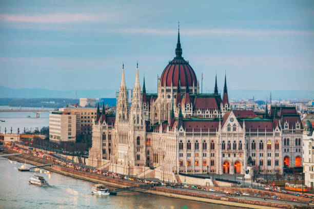 Parliament building in Budapest, Hungary Parliament building in Budapest, Hungary at sunset danube river stock pictures, royalty-free photos & images