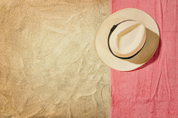 istock Top view towel on sandy beach. Background with copy space 655552200