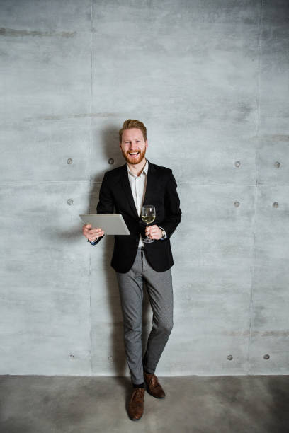 istock Cool and handsome businessman celebrating 655557952