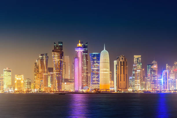 istock Doha City Skyline Illuminating the Night in Qatar 655560428