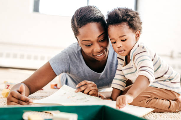 istock Mom reading for toddler 655574974