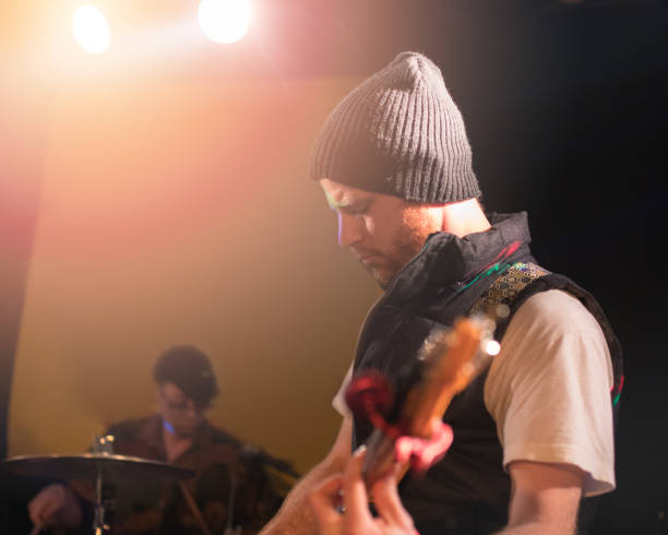 istock Live performance of rock band 655582524