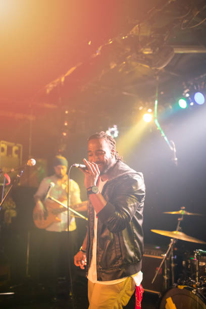 istock Rock band perfomance in live house 655582586