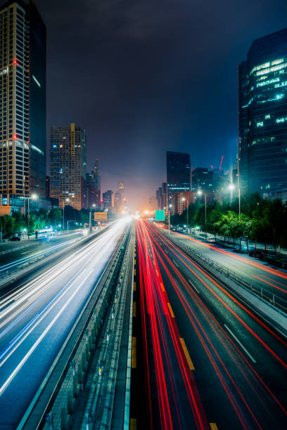 istock urban traffic with cityscape 655591122