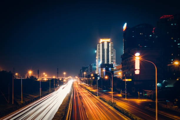istock urban traffic with cityscape 655593648