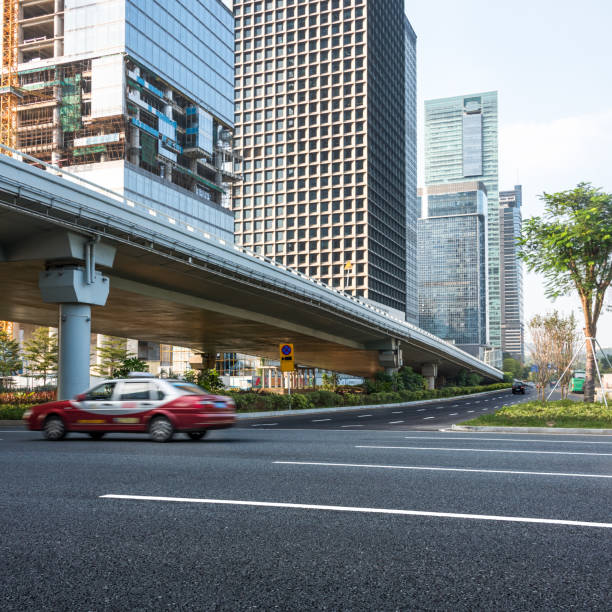 istock urban traffic with cityscape 655599438