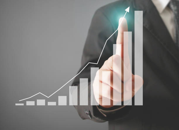 istock financial symbols coming from hand 655599756