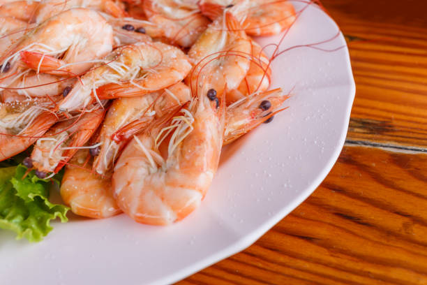 istock Baked butter shrimp on white dish 655600988