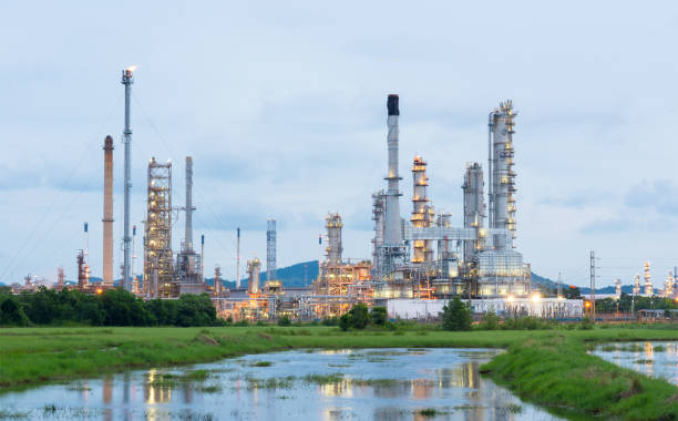 istock Oil refinery plant at sunrise with blue sky background 655604216
