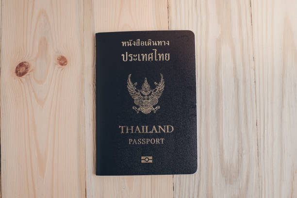 istock Thailand passport on the wooden table 655604712