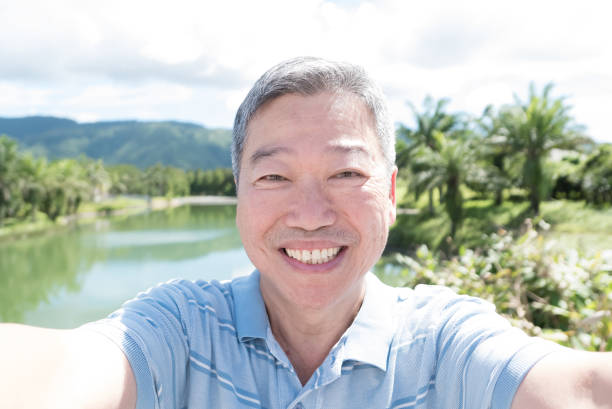 istock old man smile and selfie 655610572