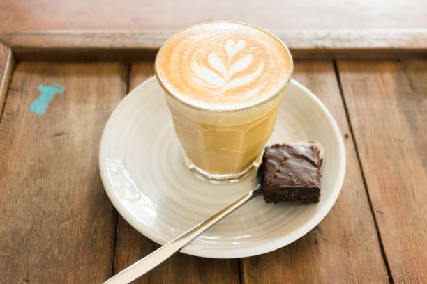 istock coffee with brownie on wooden plate background 655616806