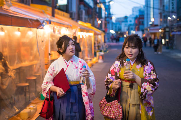 istock Young women in Hakama walking in town 655617424