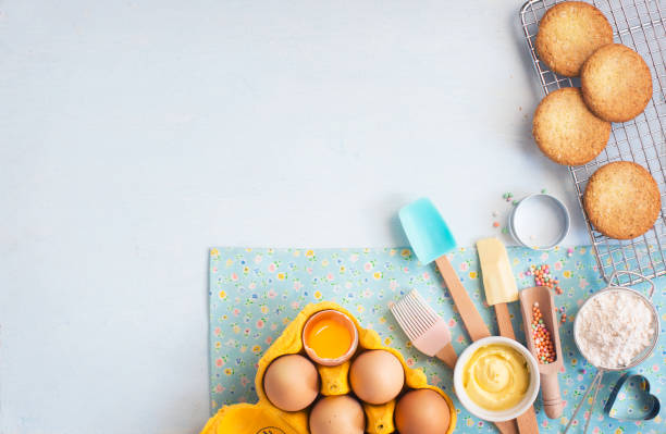 istock Baking utensil and ingredients on light blue background. 655619604
