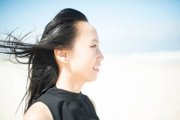 istock Beautiful mixed race lady at beach 655626308