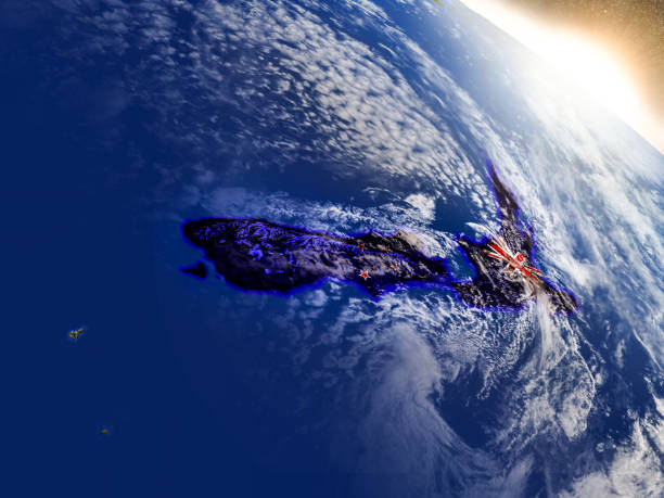 New Zealand with embedded flag on planet surface during sunrise. 3D illustration with highly detailed realistic planet surface and visible city lights. 3D model of planet created and rendered in Cheetah3D software, 9 Mar 2017. Some layers of planet surface use textures furnished by NASA, Blue Marble collection: http://visibleearth.nasa.gov/view_cat.php?categoryID=1484