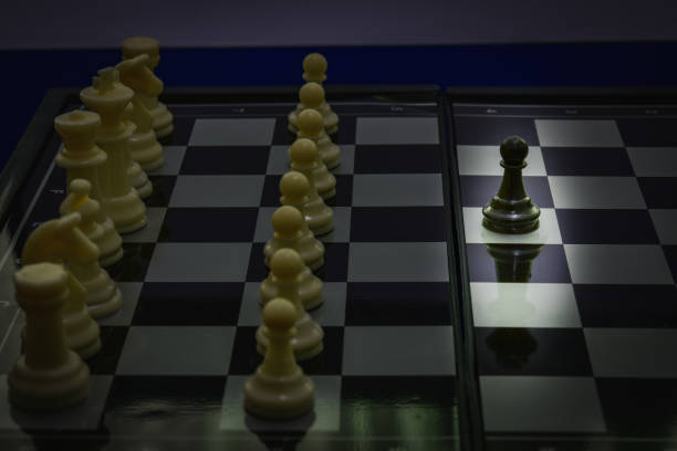 istock black pawn in king shadow fight team white chess concept teamwork business 655631488