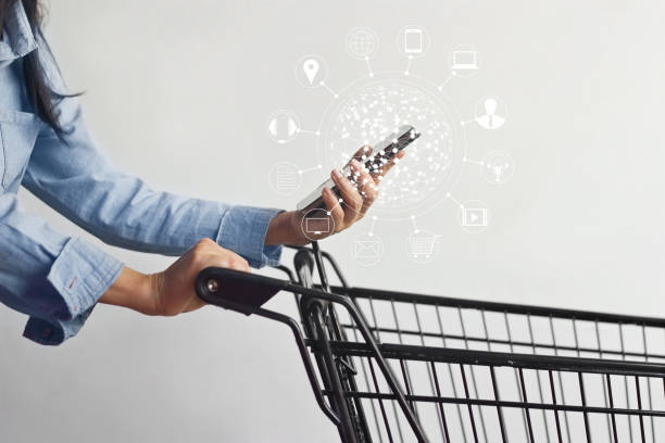 woman using mobile payments online shopping and icon customer network connection on screen, m-banking and omni channel