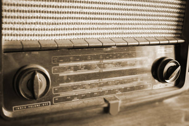 istock Retro Radio On Wooden Table 655635078