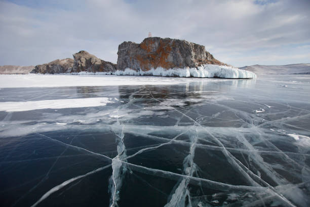 istock Mare's head Cape, cracks in ice of Lake Baikal, Olkhon island. 655640614