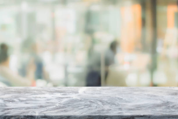 istock Stone table top and blurred restaurant interior background - can used for display or montage your products. 655651576