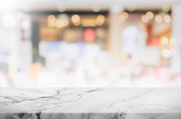istock Stone table top and blurred restaurant interior background - can used for display or montage your products. 655651592