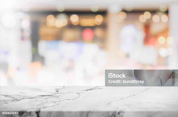Stone Table Top And Blurred Restaurant Interior Background Can Used For Display Or Montage Your Products Stock Photo - Download Image Now