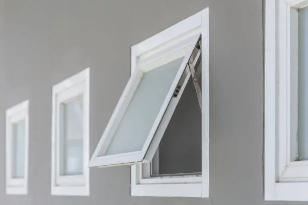 Photo of awning window open, modern home aluminium push windows.