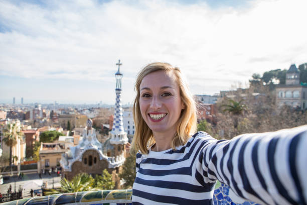 istock Young woman taking selfie in Barcelona 655660186
