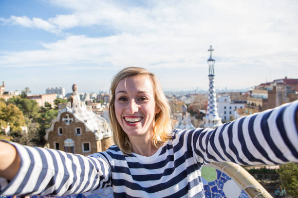 istock Young woman taking selfie in Barcelona 655660318