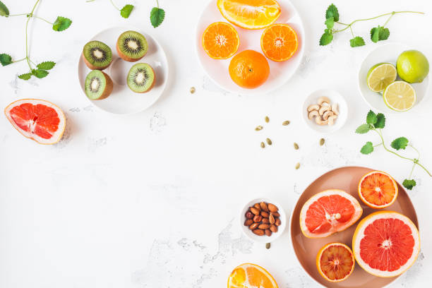 istock Colorful fresh fruit on white table. Flat lay, top view 655663058